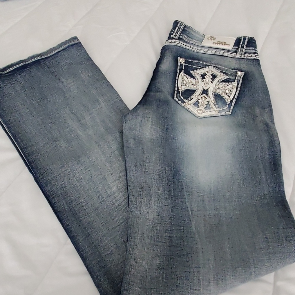 SEXY COTURE jeans. New no tag  Rise measur 33 1/2